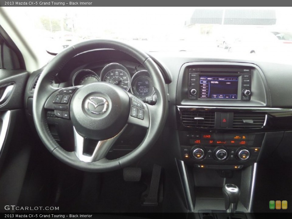 Black Interior Dashboard for the 2013 Mazda CX-5 Grand Touring #90797057
