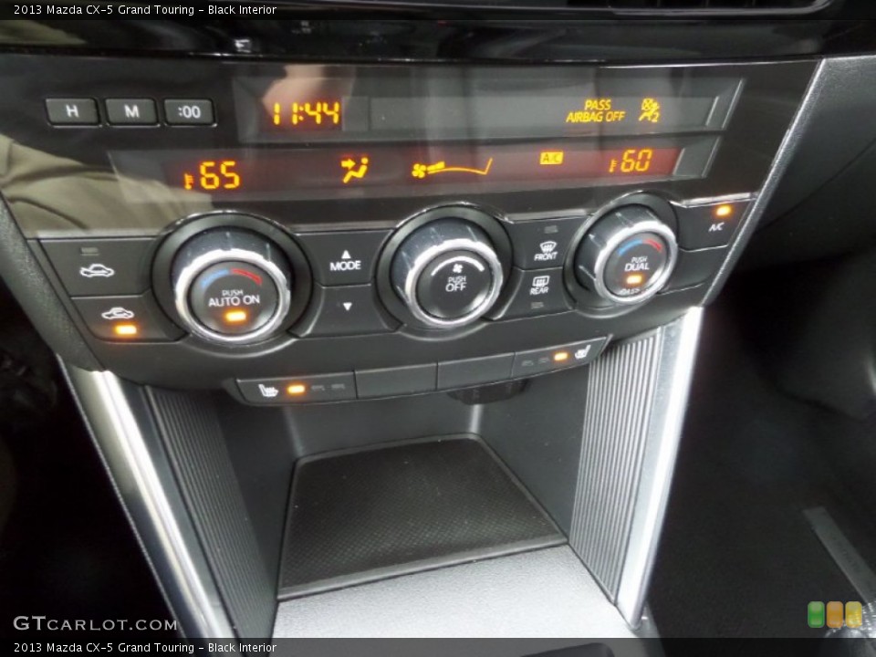 Black Interior Controls for the 2013 Mazda CX-5 Grand Touring #90797136