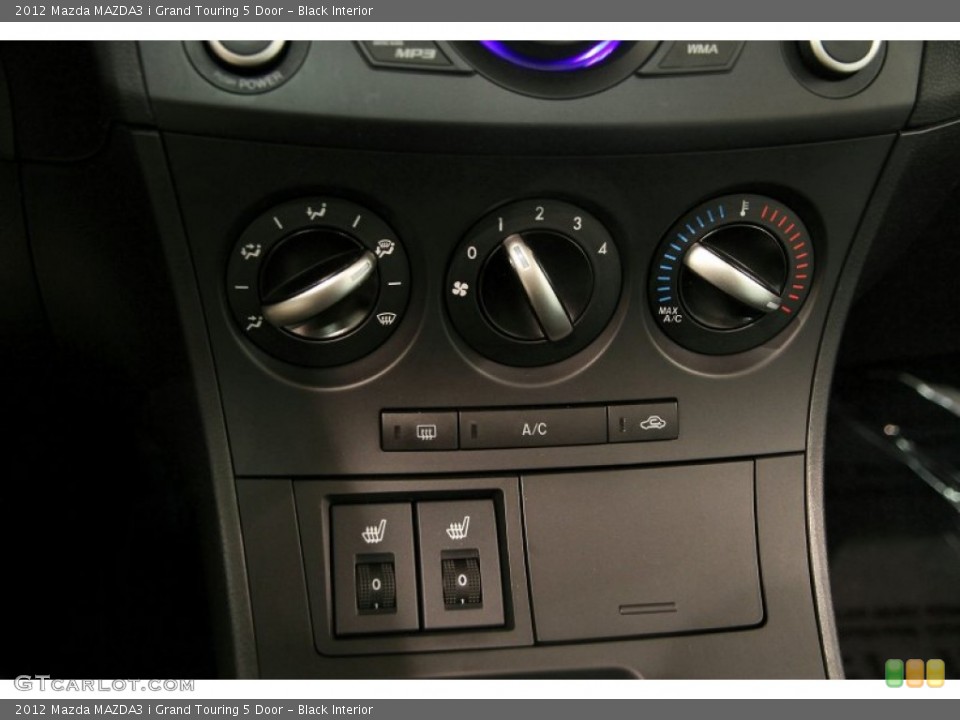 Black Interior Controls for the 2012 Mazda MAZDA3 i Grand Touring 5 Door #90798127