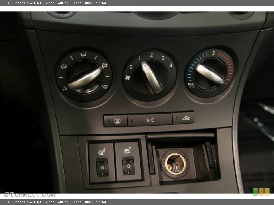 Black Interior Controls for the 2012 Mazda MAZDA3 i Grand Touring 5 Door #90798153