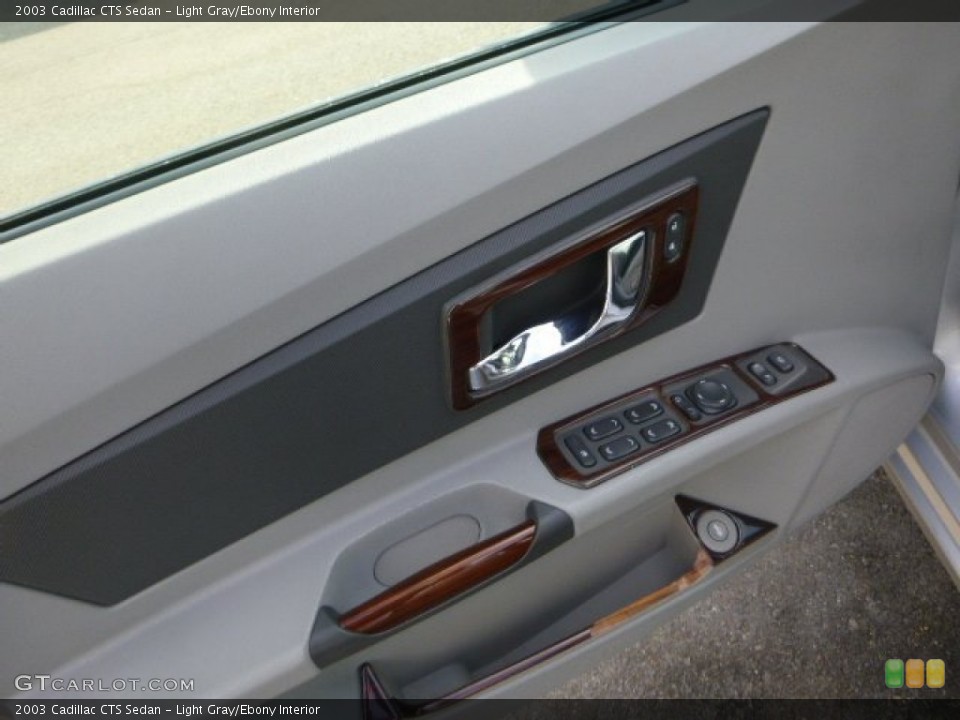 Light Gray/Ebony Interior Door Panel for the 2003 Cadillac CTS Sedan #90877970