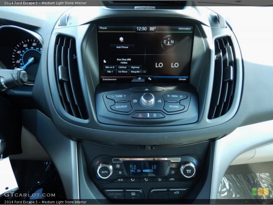 Medium Light Stone Interior Controls for the 2014 Ford Escape S #90957236
