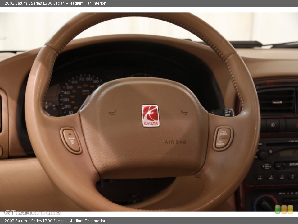 Medium Tan Interior Steering Wheel for the 2002 Saturn L Series L300 Sedan #91122871