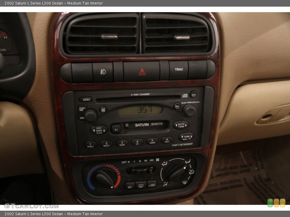 Medium Tan Interior Controls for the 2002 Saturn L Series L300 Sedan #91122926