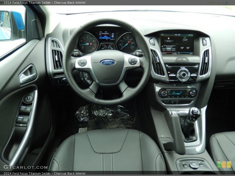 Charcoal Black Interior Dashboard for the 2014 Ford Focus Titanium Sedan #91130287