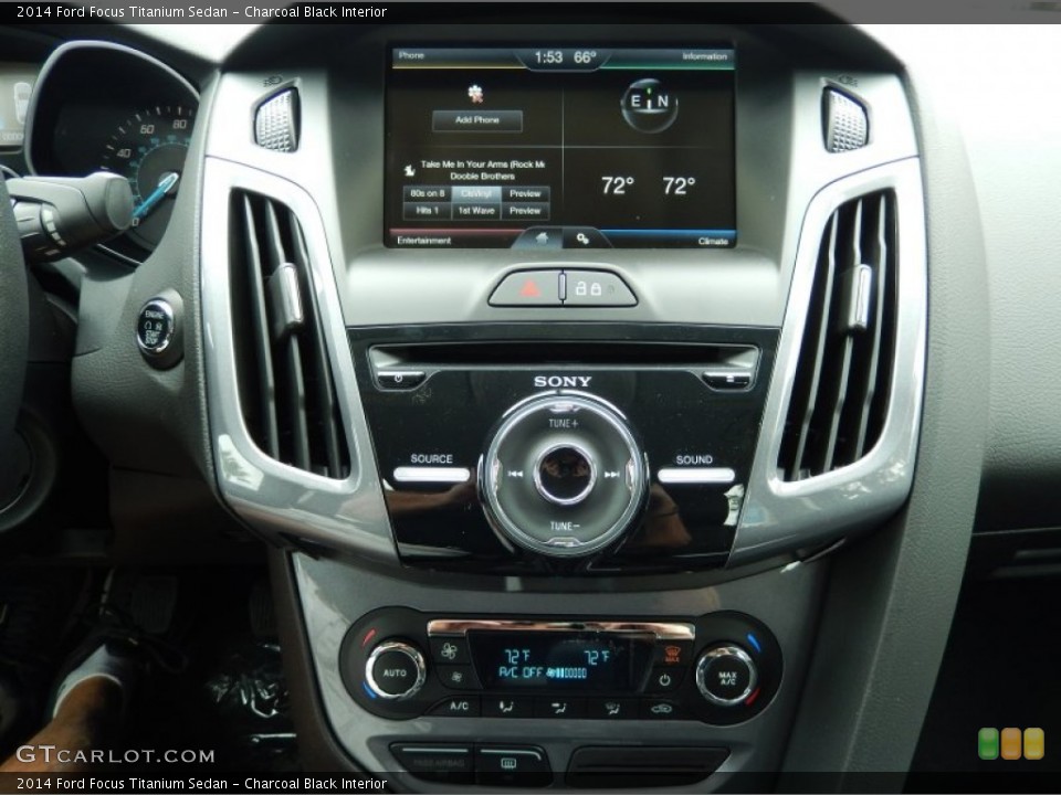 Charcoal Black Interior Controls for the 2014 Ford Focus Titanium Sedan #91130337