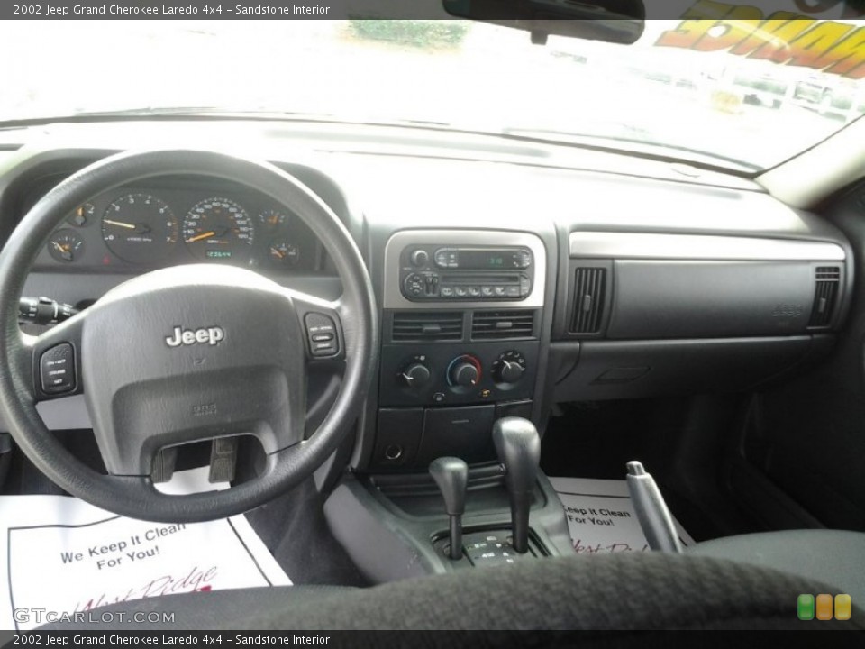 Sandstone Interior Dashboard for the 2002 Jeep Grand Cherokee Laredo 4x4 #91238029