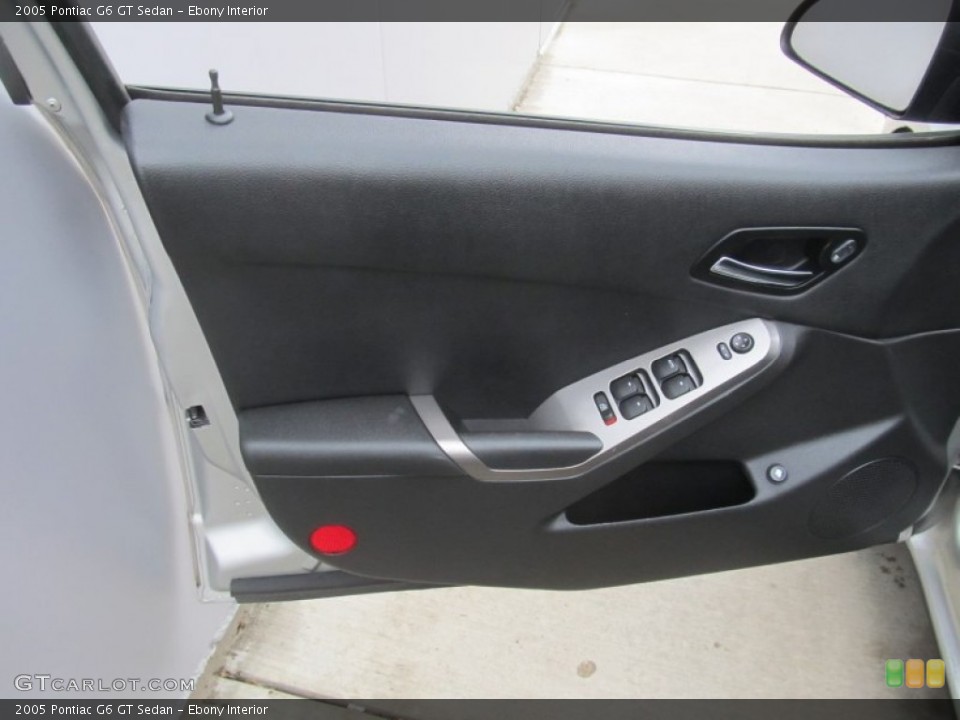Ebony Interior Door Panel for the 2005 Pontiac G6 GT Sedan #91295057
