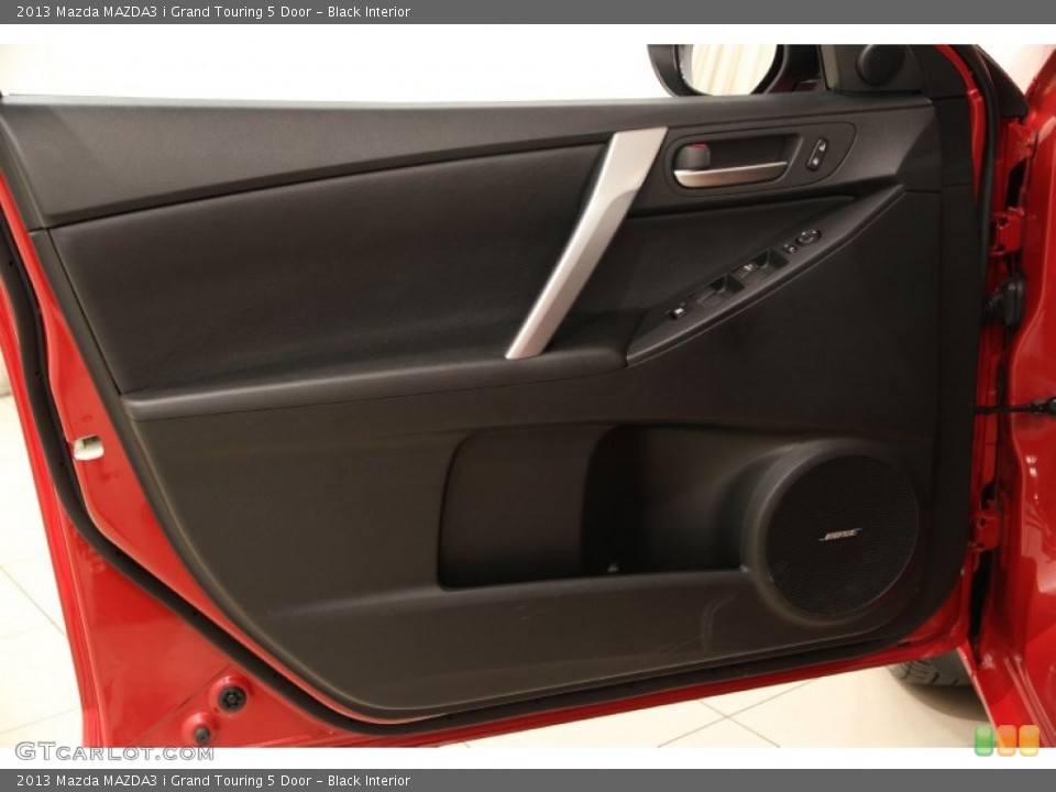 Black Interior Door Panel for the 2013 Mazda MAZDA3 i Grand Touring 5 Door #91708555