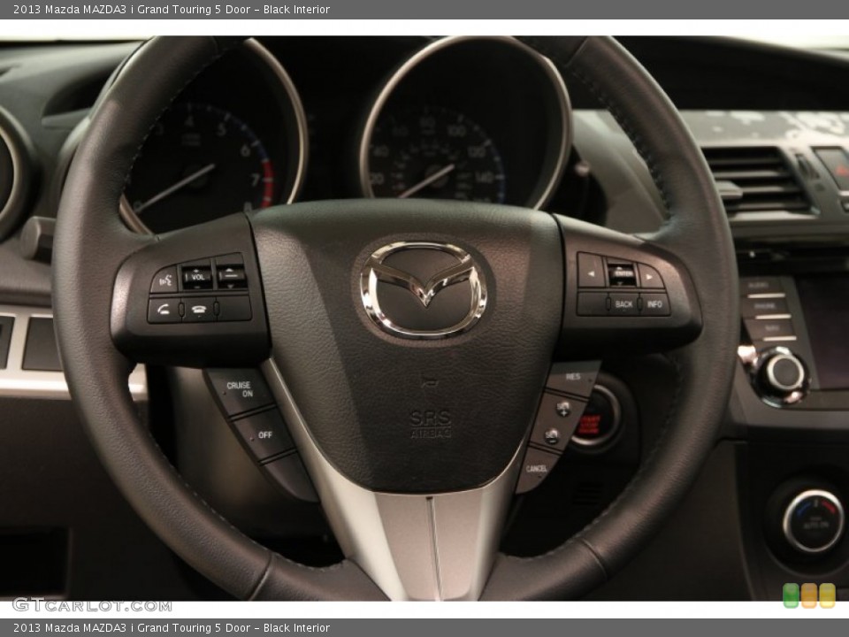 Black Interior Steering Wheel for the 2013 Mazda MAZDA3 i Grand Touring 5 Door #91708600