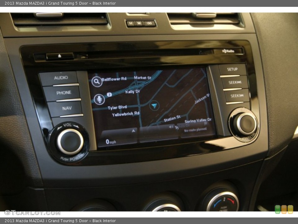 Black Interior Controls for the 2013 Mazda MAZDA3 i Grand Touring 5 Door #91708864
