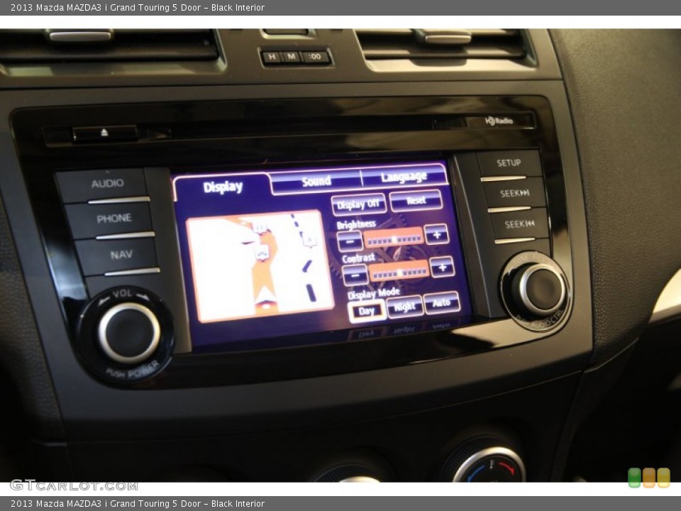 Black Interior Controls for the 2013 Mazda MAZDA3 i Grand Touring 5 Door #91708885