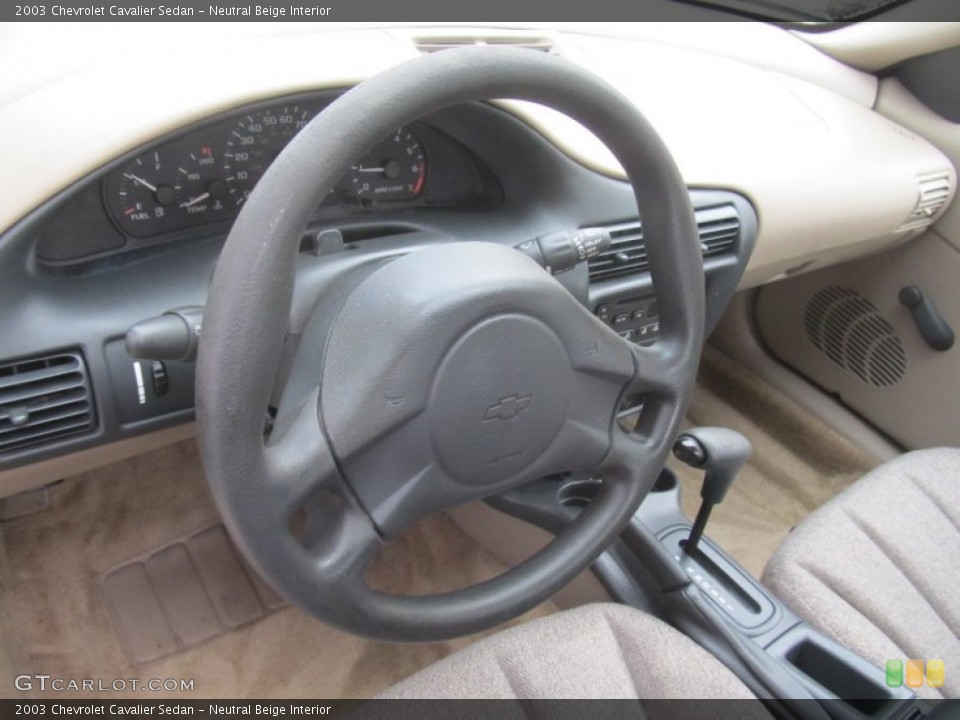 Neutral Beige Interior Dashboard for the 2003 Chevrolet Cavalier Sedan #91721719