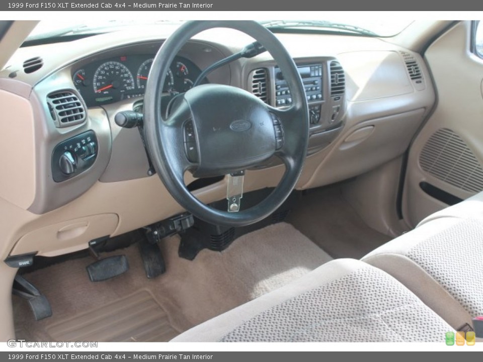 Medium Prairie Tan Interior Prime Interior for the 1999 Ford F150 XLT Extended Cab 4x4 #91807133