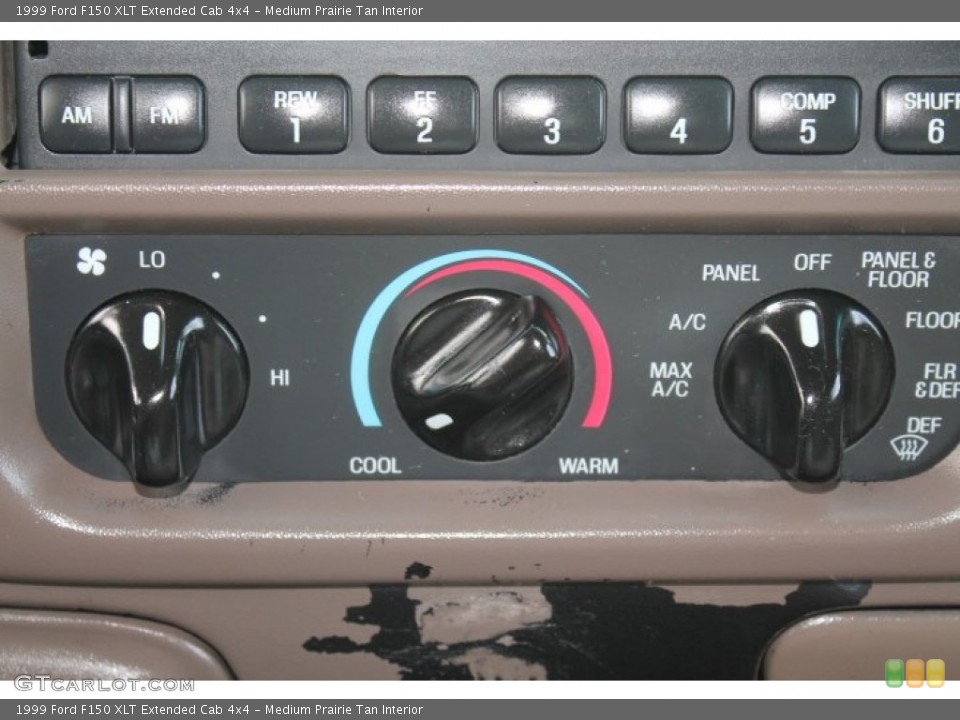 Medium Prairie Tan Interior Controls for the 1999 Ford F150 XLT Extended Cab 4x4 #91807177