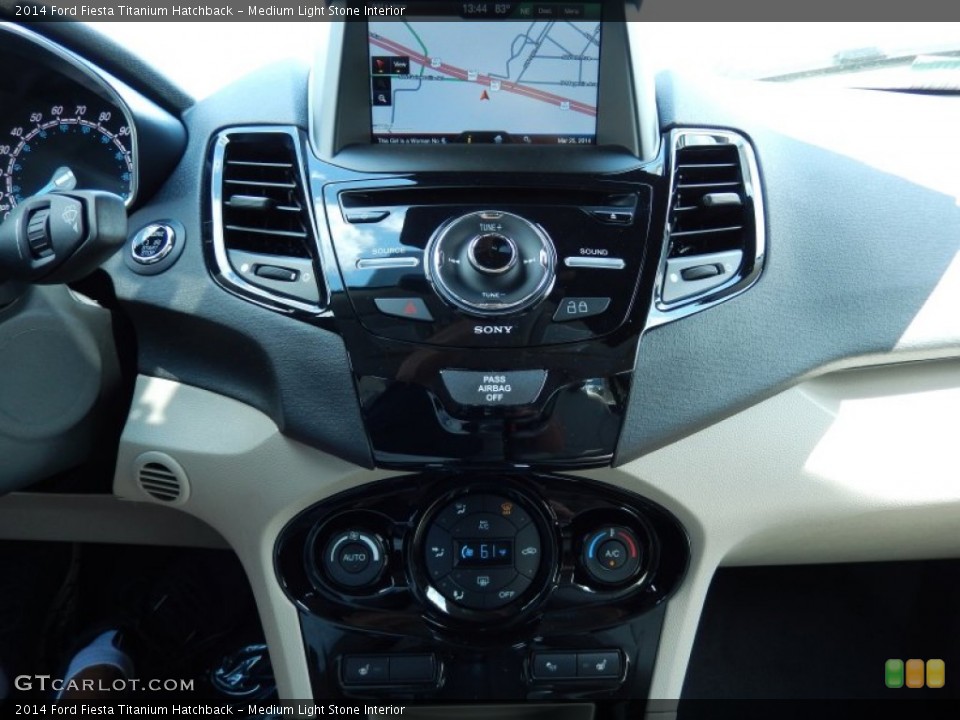 Medium Light Stone Interior Controls for the 2014 Ford Fiesta Titanium Hatchback #91871297