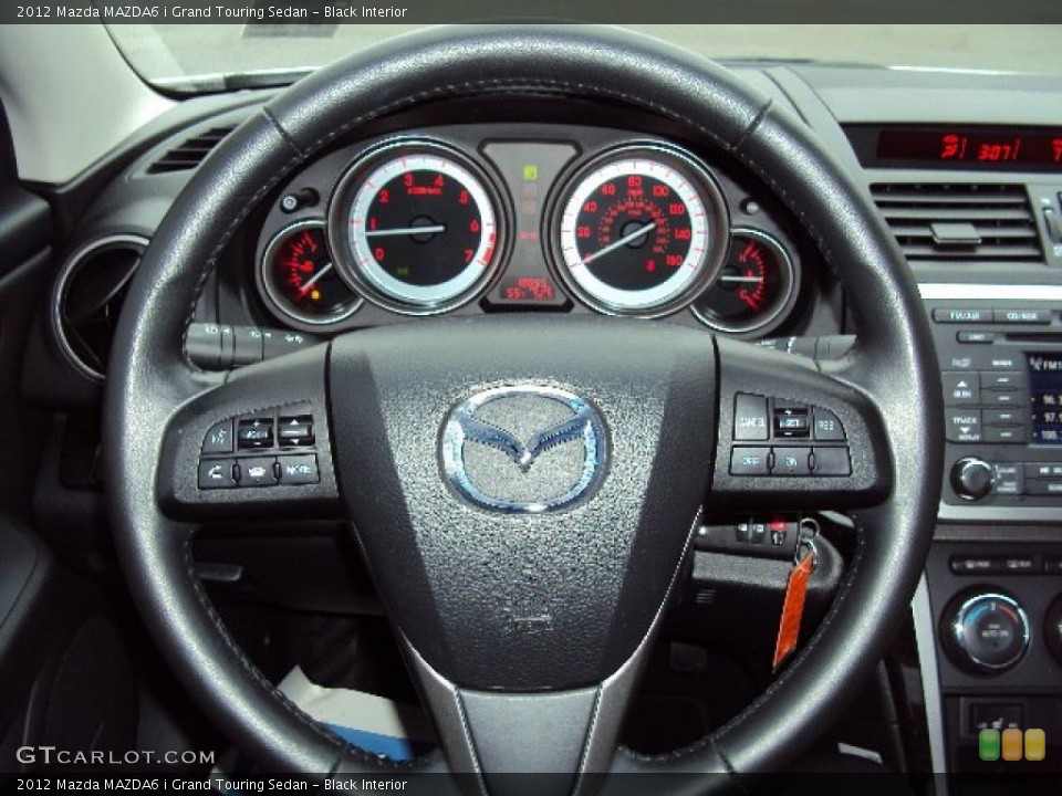 Black Interior Steering Wheel for the 2012 Mazda MAZDA6 i Grand Touring Sedan #91980668
