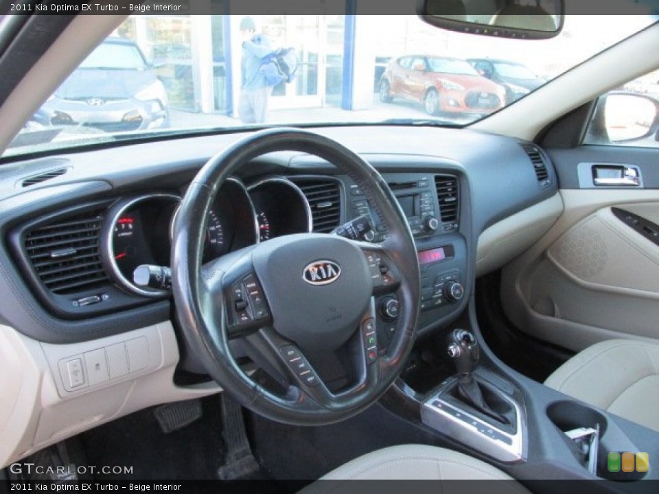 Beige Interior Dashboard for the 2011 Kia Optima EX Turbo #92028488