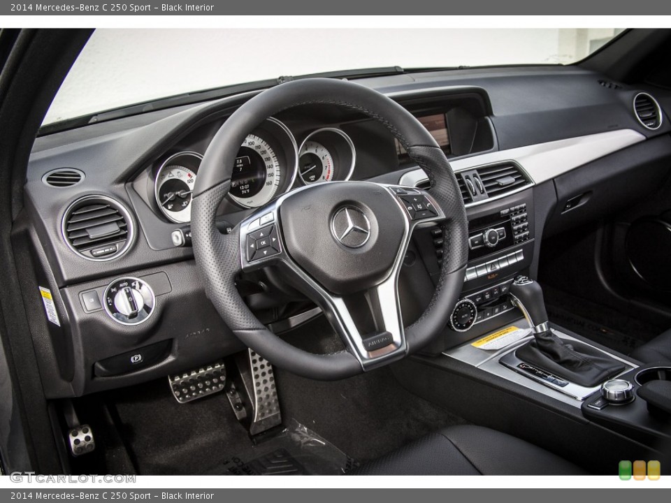 Black Interior Dashboard for the 2014 Mercedes-Benz C 250 Sport #92635748