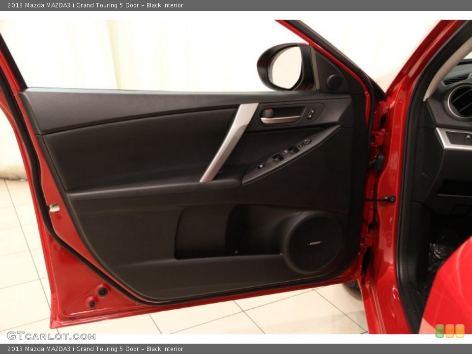 Black Interior Door Panel for the 2013 Mazda MAZDA3 i Grand Touring 5 Door #93049921