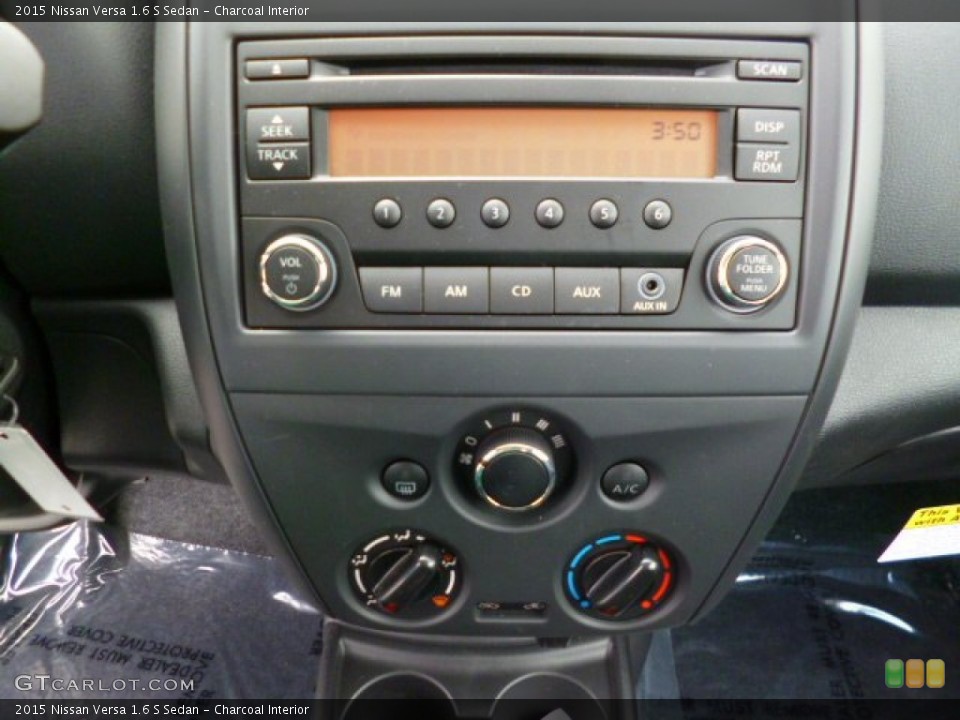 Charcoal Interior Controls for the 2015 Nissan Versa 1.6 S Sedan #93064129