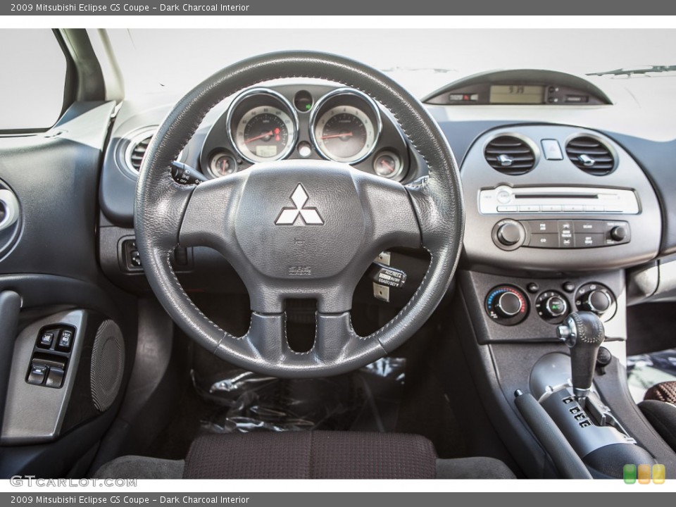 Dark Charcoal Interior Dashboard for the 2009 Mitsubishi Eclipse GS Coupe #93082324