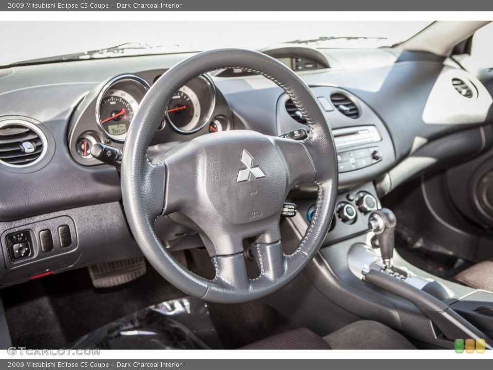 Dark Charcoal Interior Dashboard for the 2009 Mitsubishi Eclipse GS Coupe #93082756