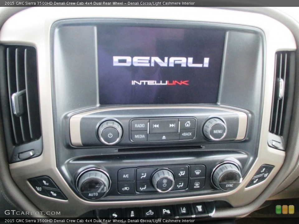 Denali Cocoa/Light Cashmere Interior Controls for the 2015 GMC Sierra 3500HD Denali Crew Cab 4x4 Dual Rear Wheel #93193324