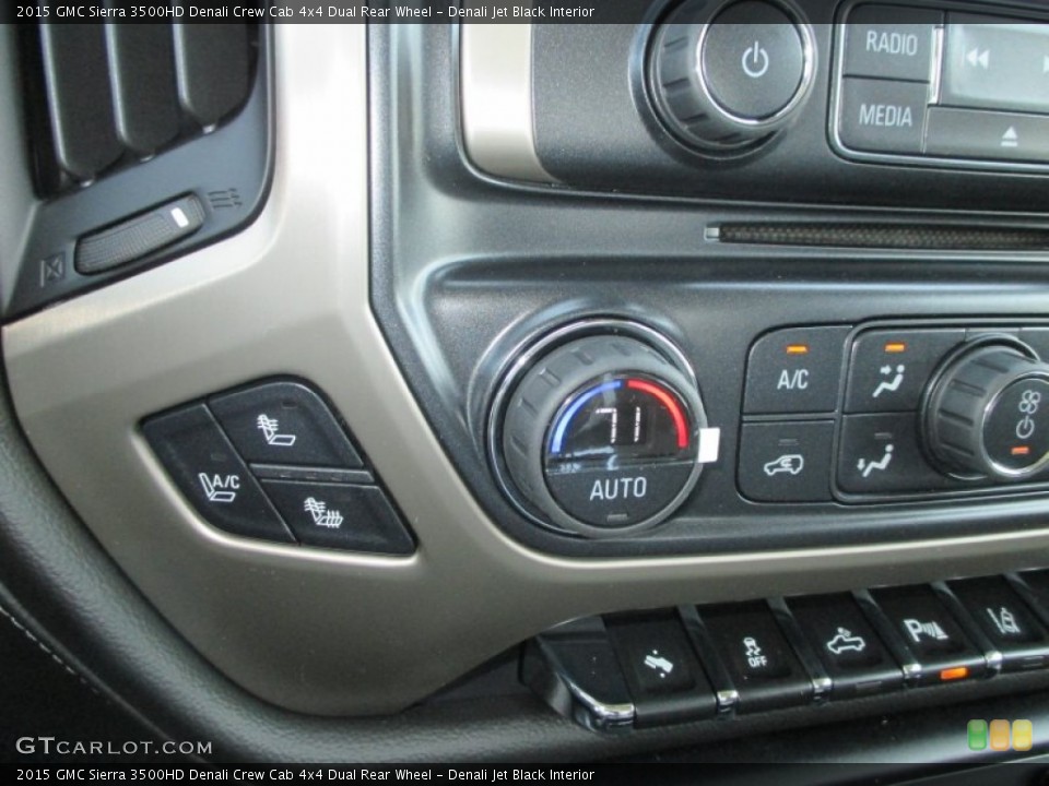 Denali Jet Black Interior Controls for the 2015 GMC Sierra 3500HD Denali Crew Cab 4x4 Dual Rear Wheel #93285374