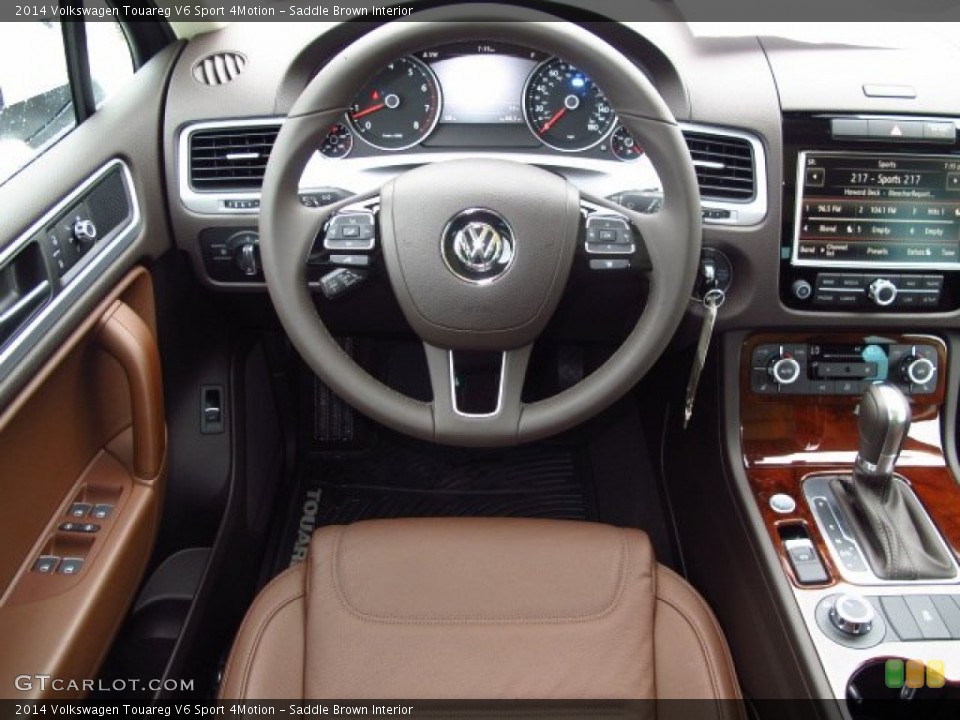 Saddle Brown Interior Dashboard for the 2014 Volkswagen Touareg V6 Sport 4Motion #93372341