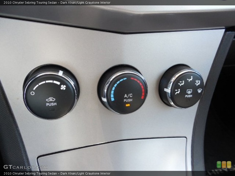 Dark Khaki/Light Graystone Interior Controls for the 2010 Chrysler Sebring Touring Sedan #93390643