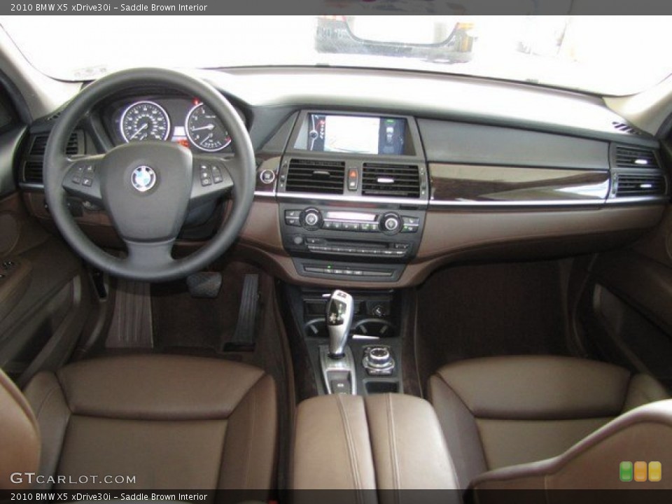 Saddle Brown Interior Dashboard for the 2010 BMW X5 xDrive30i #93517968
