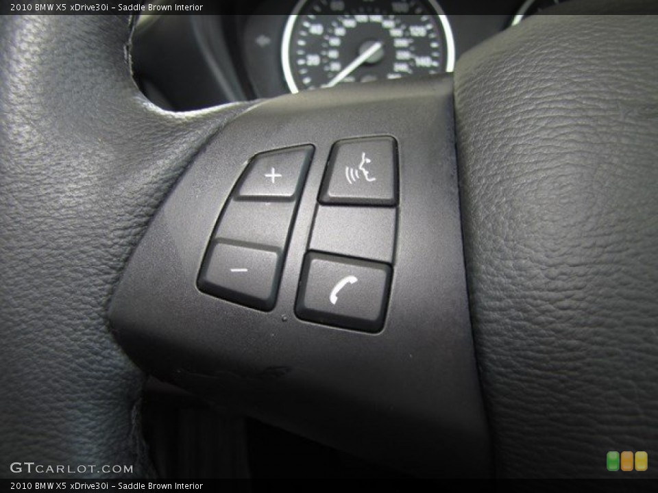 Saddle Brown Interior Controls for the 2010 BMW X5 xDrive30i #93518138