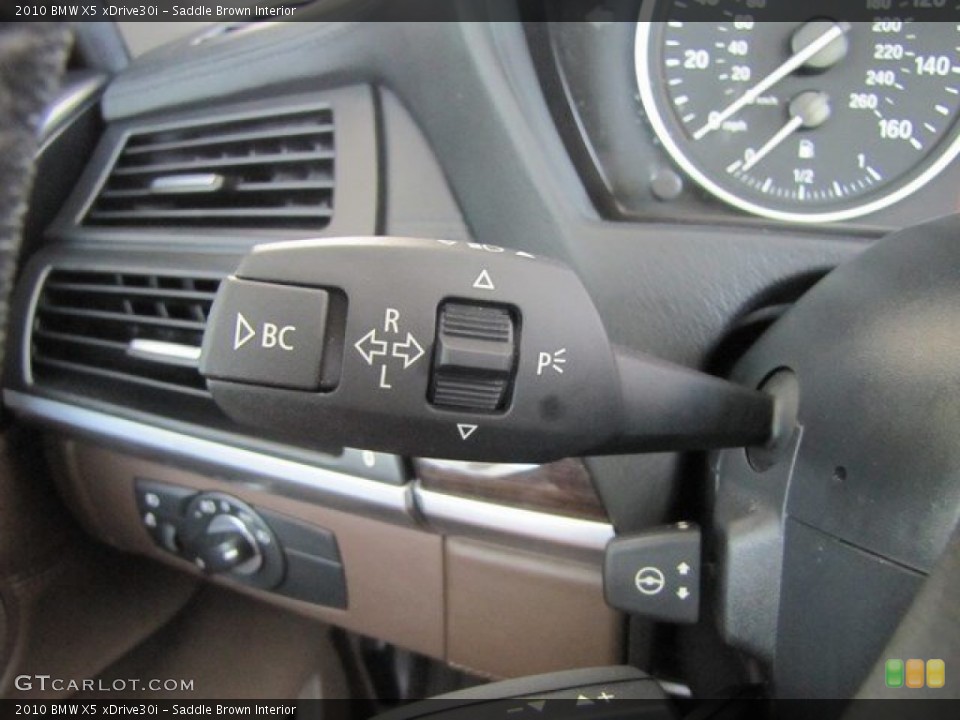 Saddle Brown Interior Controls for the 2010 BMW X5 xDrive30i #93518153
