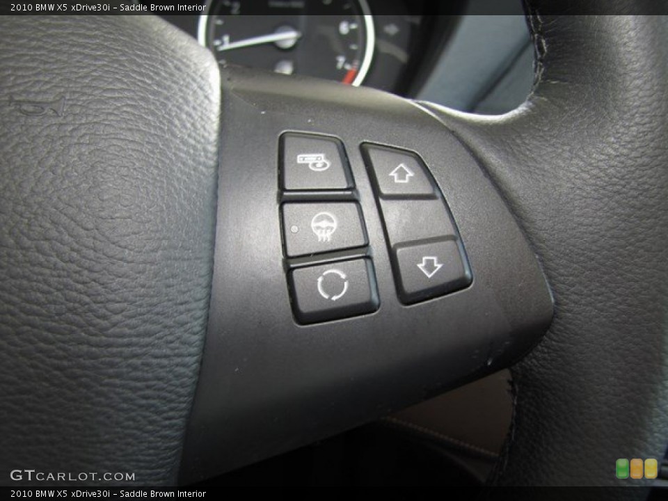 Saddle Brown Interior Controls for the 2010 BMW X5 xDrive30i #93518168