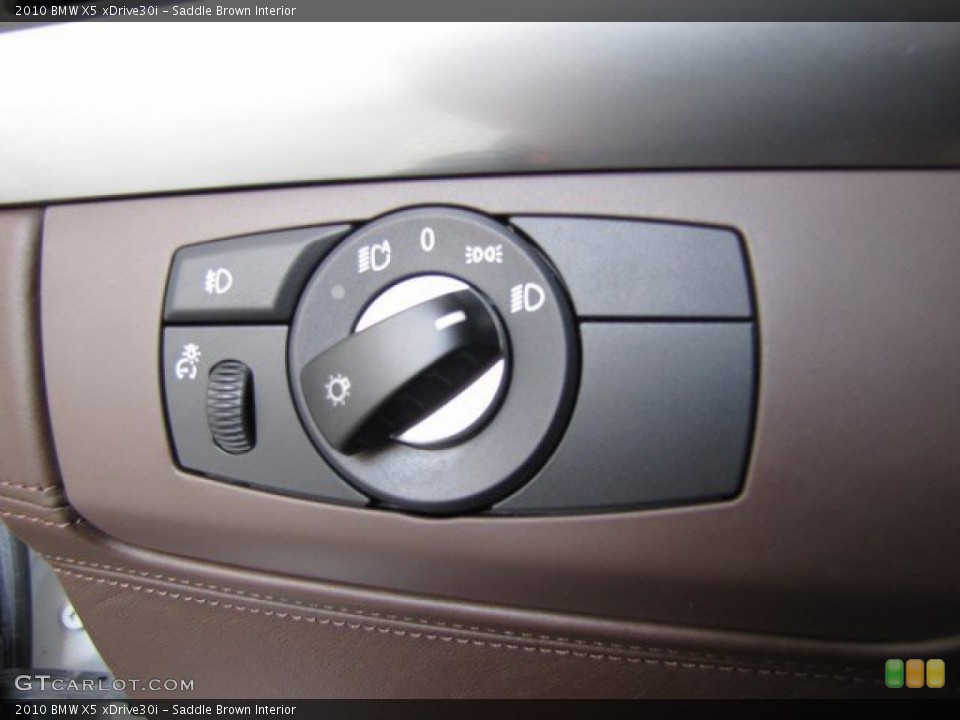 Saddle Brown Interior Controls for the 2010 BMW X5 xDrive30i #93518579
