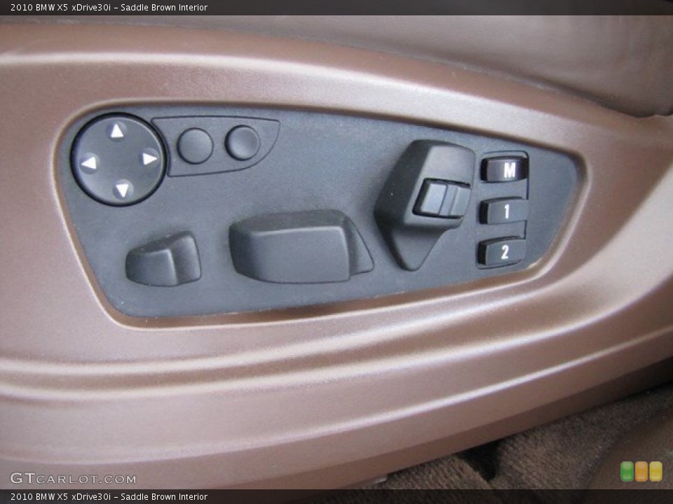 Saddle Brown Interior Controls for the 2010 BMW X5 xDrive30i #93518642