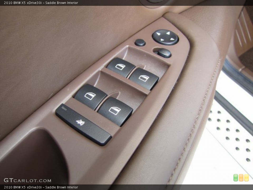 Saddle Brown Interior Controls for the 2010 BMW X5 xDrive30i #93518666