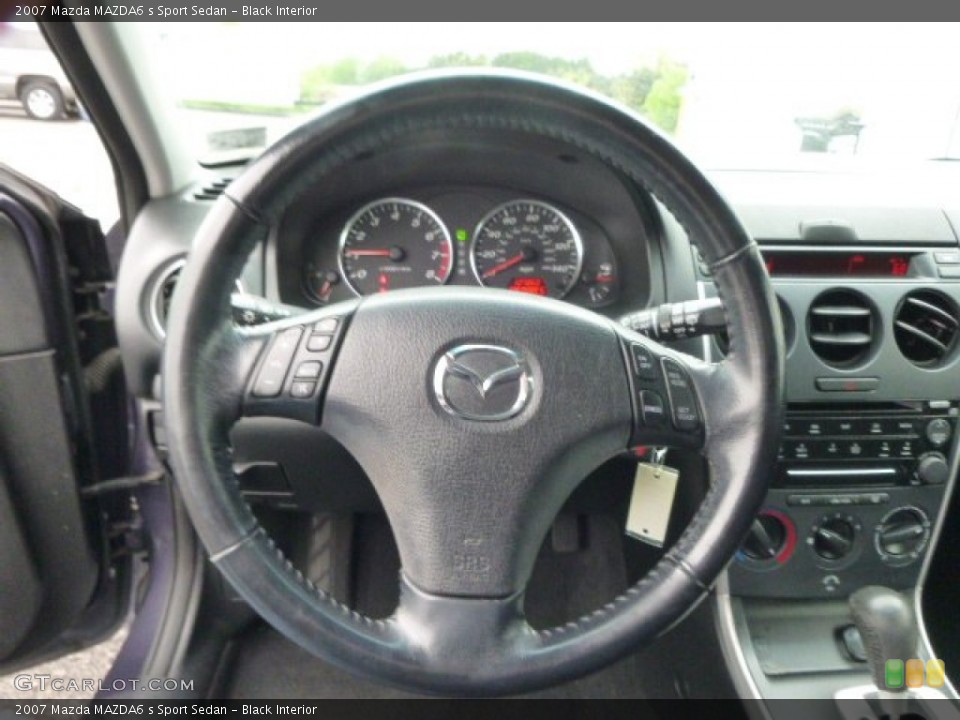 Black Interior Steering Wheel for the 2007 Mazda MAZDA6 s Sport Sedan #93571776
