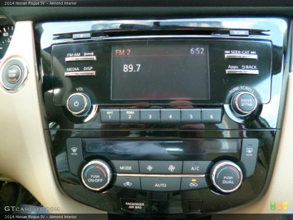 Almond Interior Controls for the 2014 Nissan Rogue SV #93613492