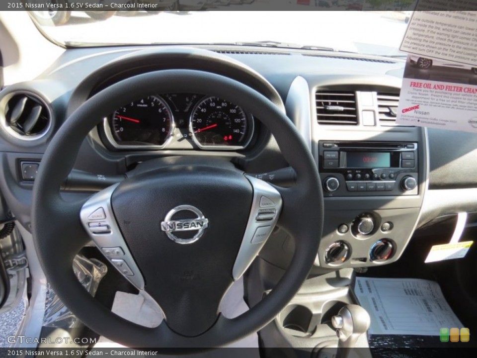 Charcoal Interior Steering Wheel for the 2015 Nissan Versa 1.6 SV Sedan #93757293