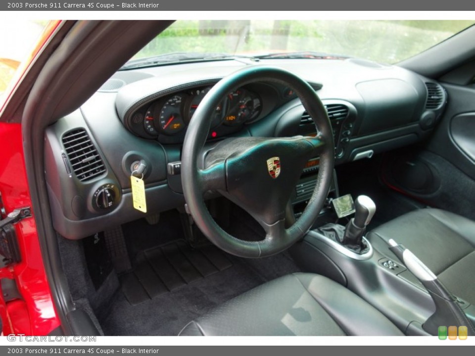 Black Interior Dashboard for the 2003 Porsche 911 Carrera 4S Coupe #93891391