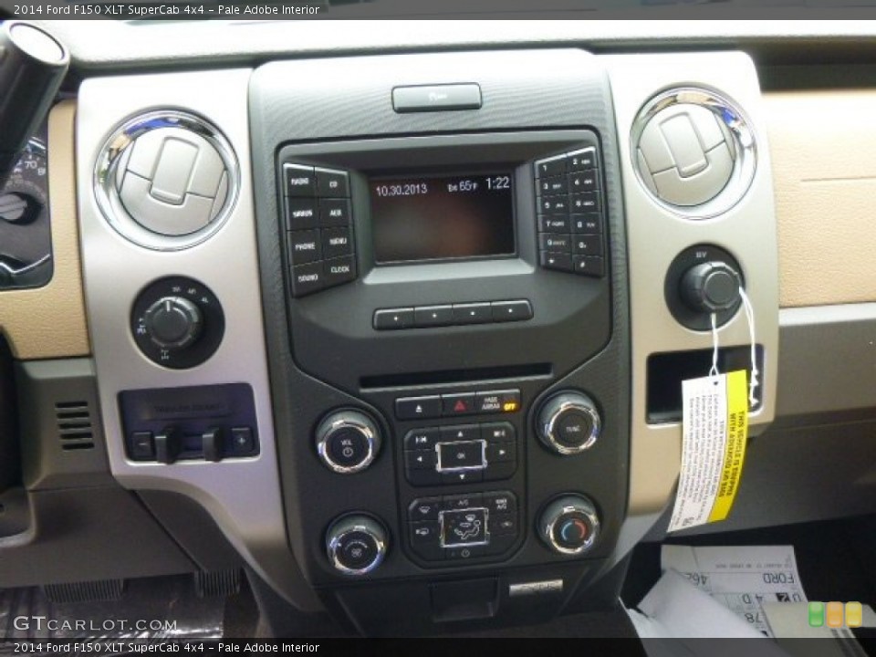 Pale Adobe Interior Controls for the 2014 Ford F150 XLT SuperCab 4x4 #93945156