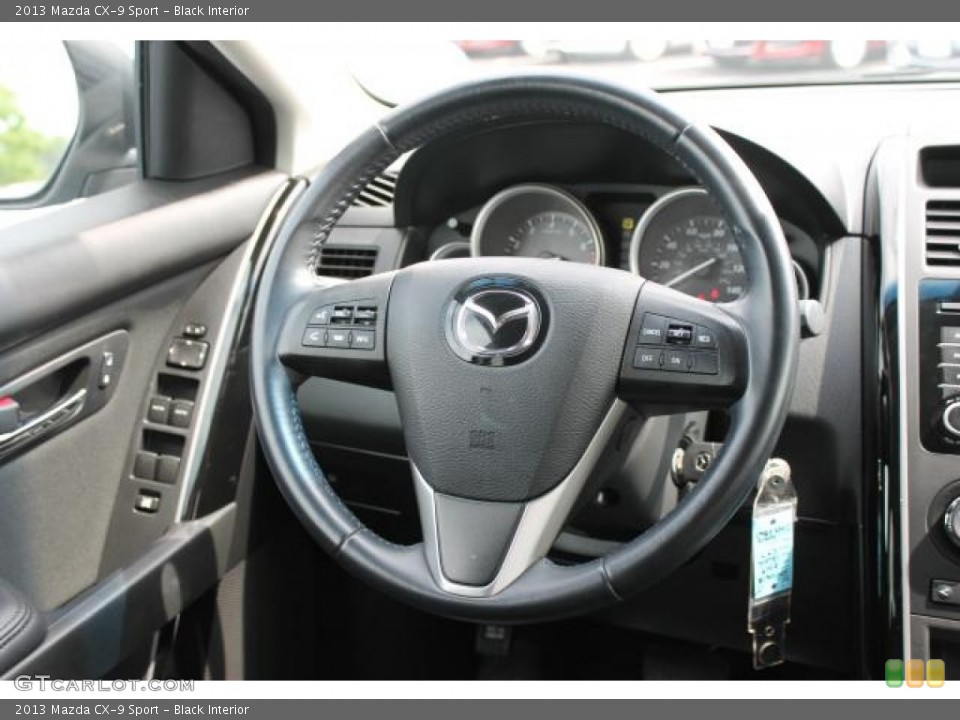 Black Interior Steering Wheel for the 2013 Mazda CX-9 Sport #93954525