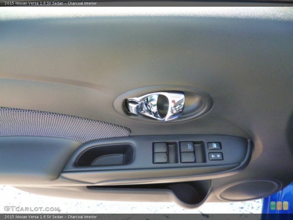 Charcoal Interior Door Panel for the 2015 Nissan Versa 1.6 SV Sedan #94022899