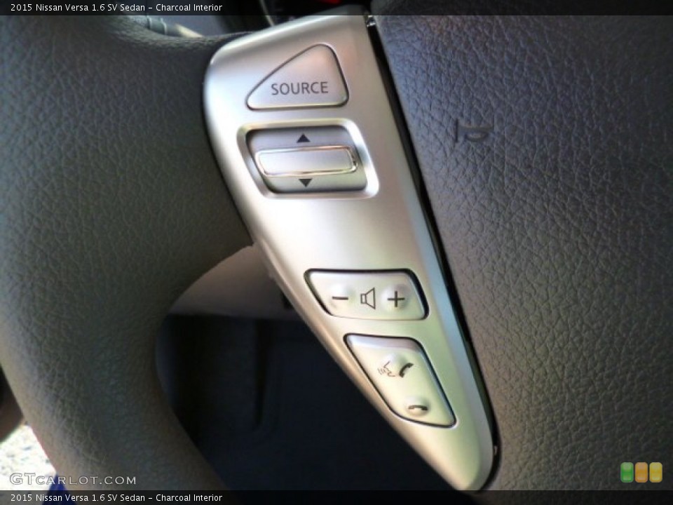 Charcoal Interior Controls for the 2015 Nissan Versa 1.6 SV Sedan #94022923