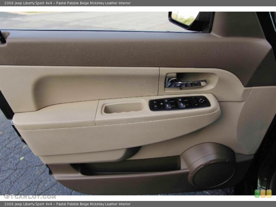 Pastel Pebble Beige Mckinley Leather Interior Door Panel for the 2009 Jeep Liberty Sport 4x4 #94049080