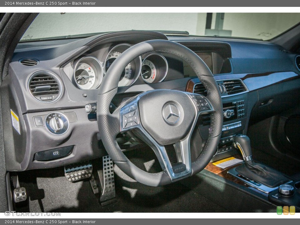 Black Interior Dashboard for the 2014 Mercedes-Benz C 250 Sport #94113520