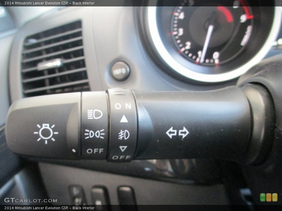 Black Interior Controls for the 2014 Mitsubishi Lancer Evolution GSR #94172064