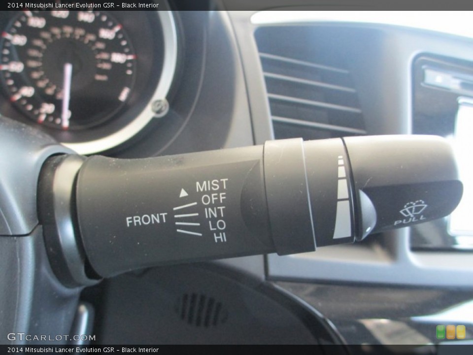 Black Interior Controls for the 2014 Mitsubishi Lancer Evolution GSR #94172076